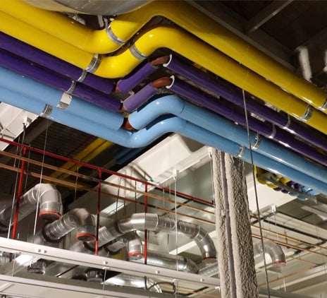 Colored insulation on ceiling pipes