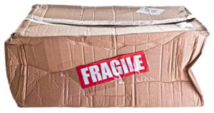 damaged cardboard parcel on white background